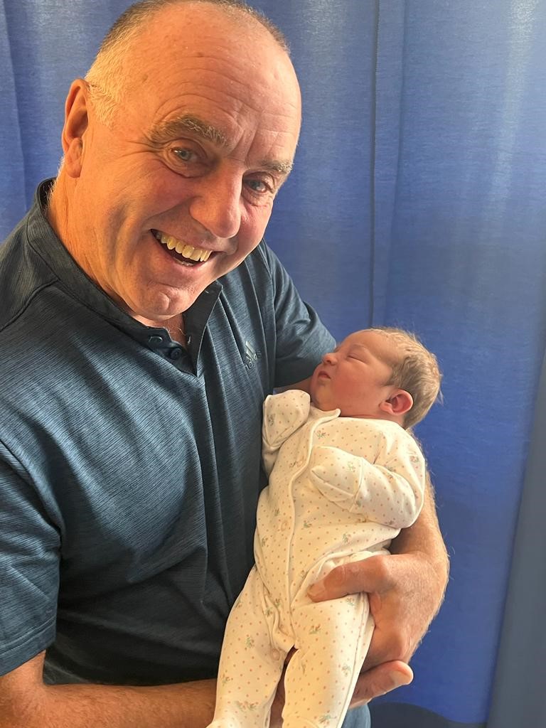 Glyn Salmon and his grandchild