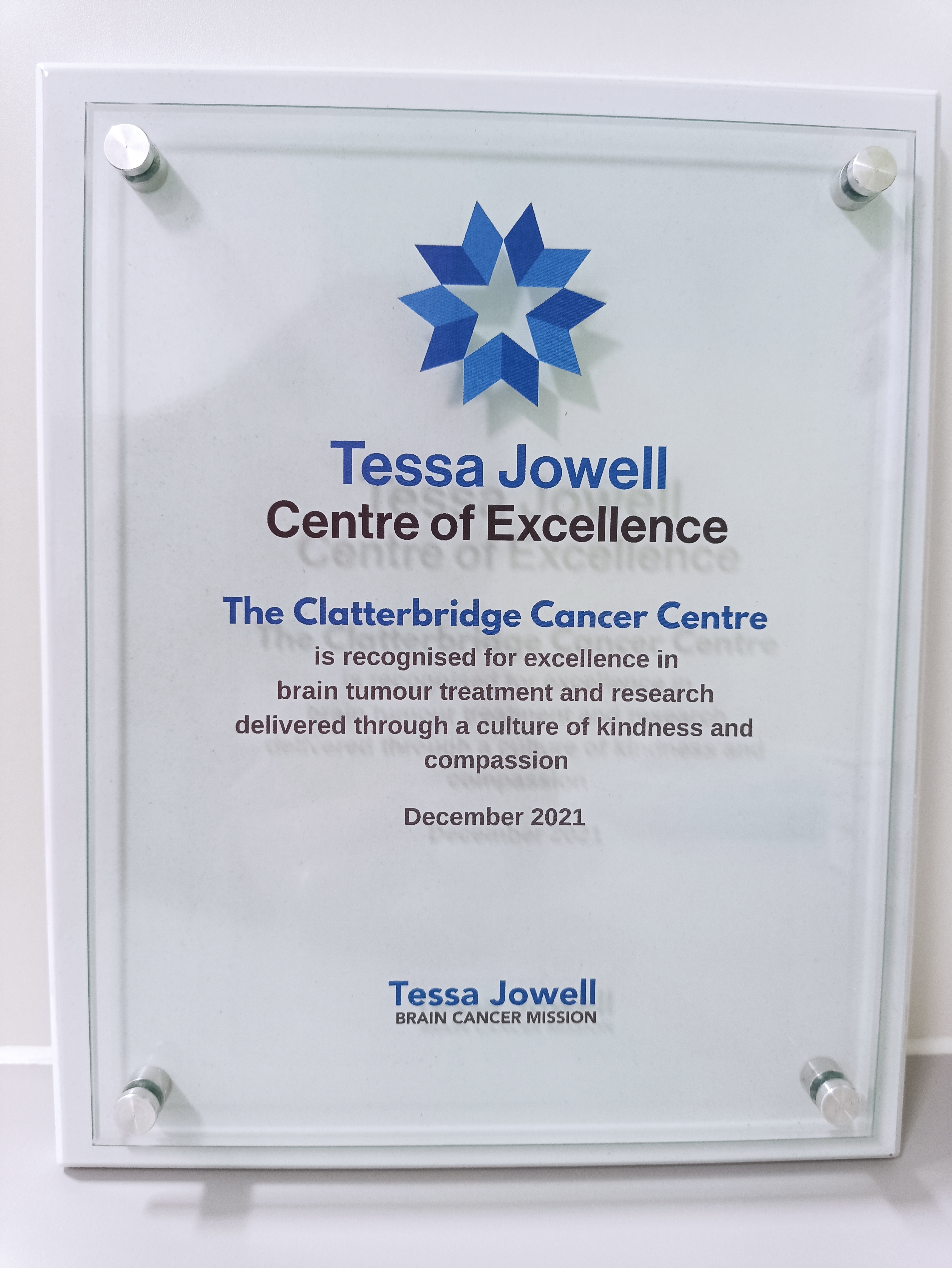 A picture of the plaque confirming The Clatterbridge Cancer Centre has been awarded Centre of Excellence status by the Tessa Jowell Brain Cancer Mission